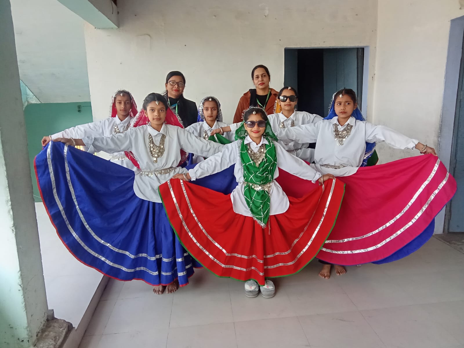 Students in traditional dance costumes